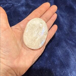 Clear selenite palm stone crystal